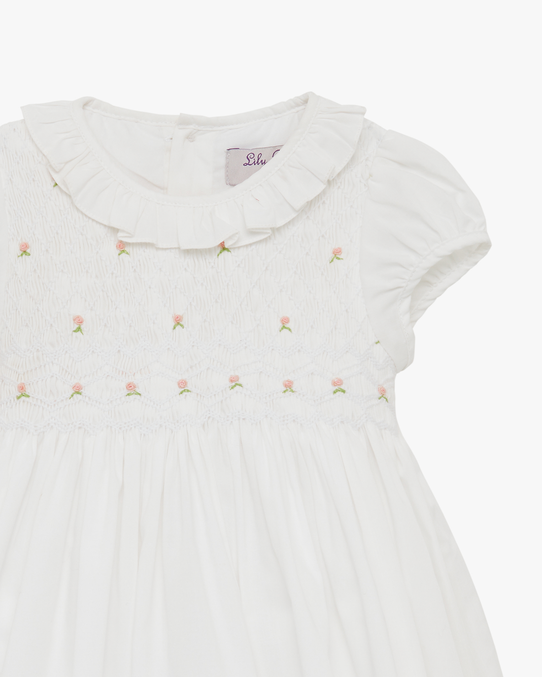Baby Willow Rose Hand Smocked Dress in White 6/12M - Trotters Baby Willow Rose Hand Smocked Dress in White 6/12M - Trotters