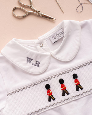 Baby Smocked Onesie in Guardsman