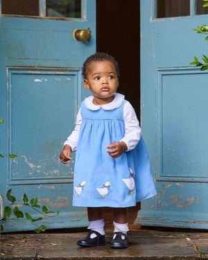 Baby Duck Smocked Pinafore in Blue Cord