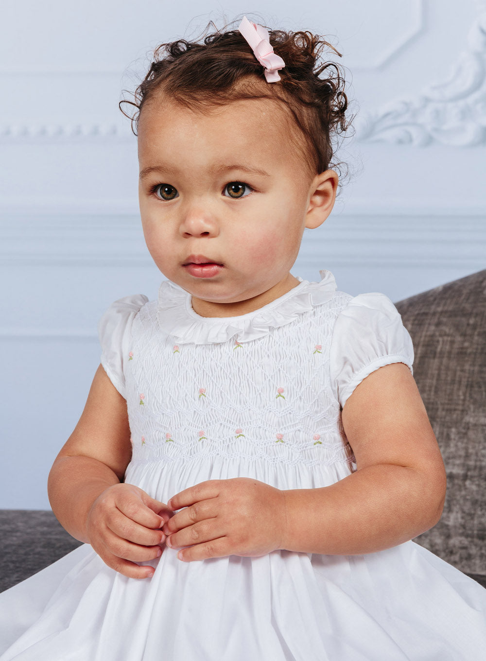 Baby Willow Rose Hand Smocked Dress in White 6/12M - Trotters Baby Willow Rose Hand Smocked Dress in White 6/12M - Trotters