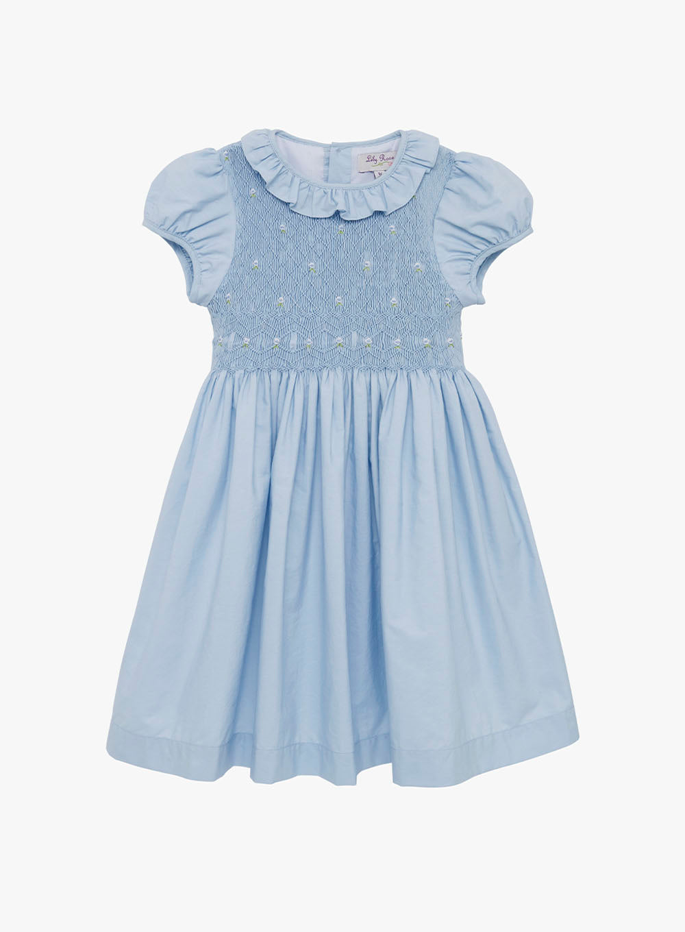 Girls Willow Rose Hand Smocked Dress in Cornflower Blue | Trotters Trotters Childrenswear USA Girls Willow Rose Hand Smocked Dress in Cornflower Blue | Trotters Trotters Childrenswear USA