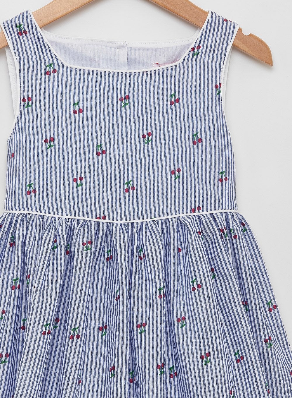 Petit Breton Dress Cherry Dress in Navy/White Stripe - Trotters Childrenswear